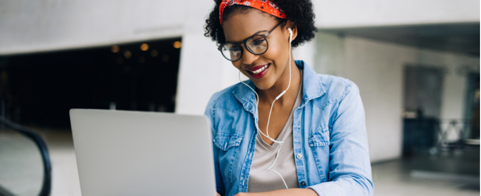 Young women learning SQL on her laptop. 